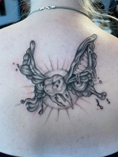 Explore chicano art tattoo ideas, creative tattoo ideas in Palm Harbor, available at Angry Owl Tattoo and Piercing