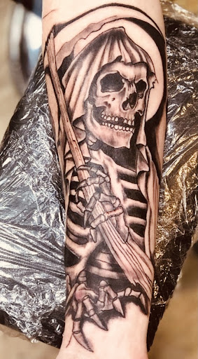 Explore playing card tattoo ideas, creative tattoo ideas in Ottumwa, available at Family Tradition TattoosPiercings