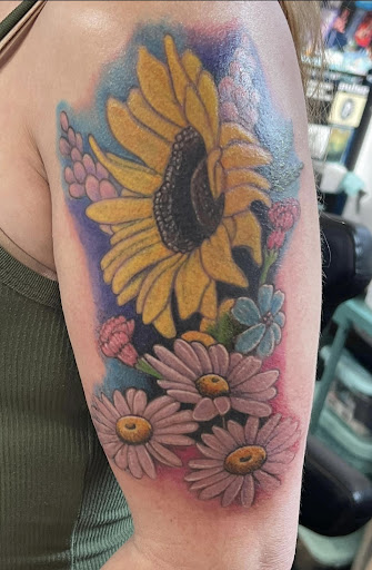 Explore cross tattoo ideas forearm, creative tattoo ideas in Danville, available at Blue Moon Tattoo & Body Piercing