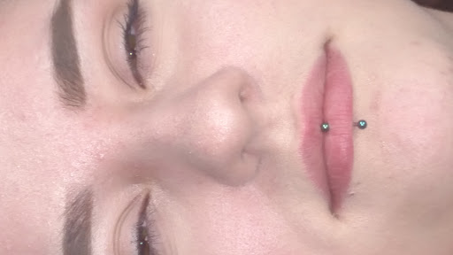 Explore neck tattoo ideas small, creative tattoo ideas in Toledo, available at Lake Erie Studio