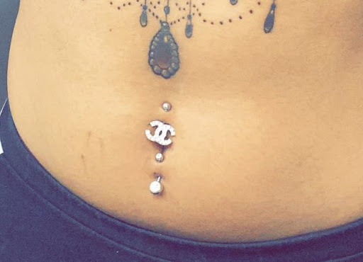 Explore black bird tattoo ideas, creative tattoo ideas in Milwaukee, available at Piercing by Dani Real Ink Tattoo Studio