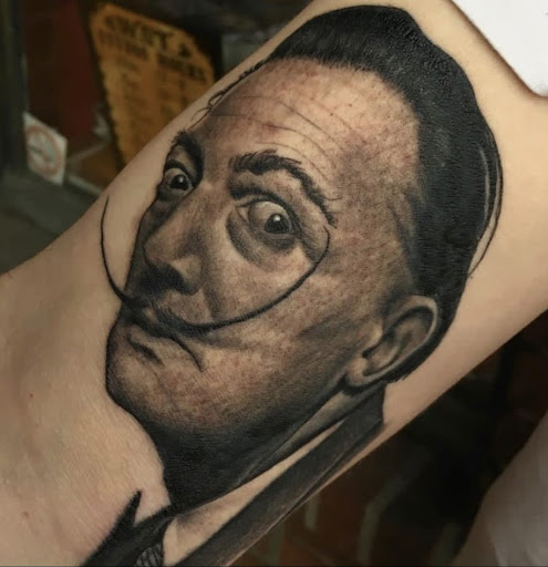 Explore hunting tattoo sleeve ideas, creative tattoo ideas in Lakeview, available at Immaculate Heart Tattoo