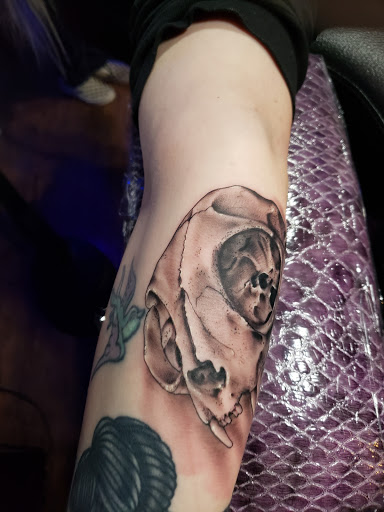 Explore neck tattoo ideas for men, creative tattoo ideas in College Station, available at Legacy Tattoo Lounge