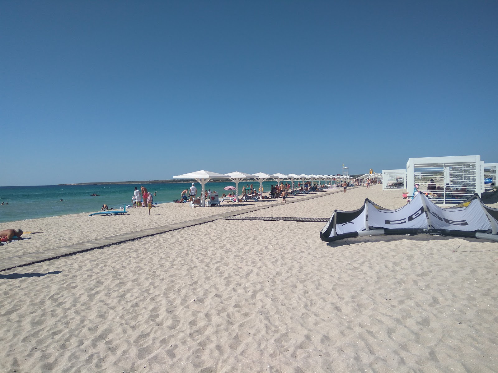 Foto von Olenevka Plyazh mit beiger sand Oberfläche