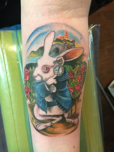 Explore vertical tattoo ideas, creative tattoo ideas in Benton, available at Three KingsTattoos