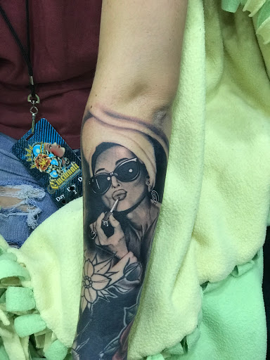 Explore men arm sleeve tattoo ideas, creative tattoo ideas in Middletown, available at Traditionally Twisted Tattoo