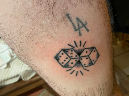 Explore trash polka tattoo ideas, creative tattoo ideas in Twentynine Palms, available at Adobe Tattoo