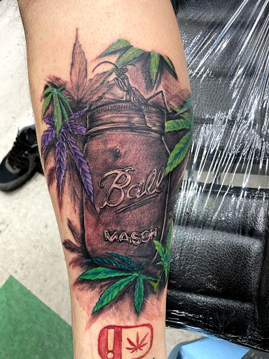 Explore butterfly spine tattoo ideas, creative tattoo ideas in Lawton, available at Impact Ink Tattoo Studios