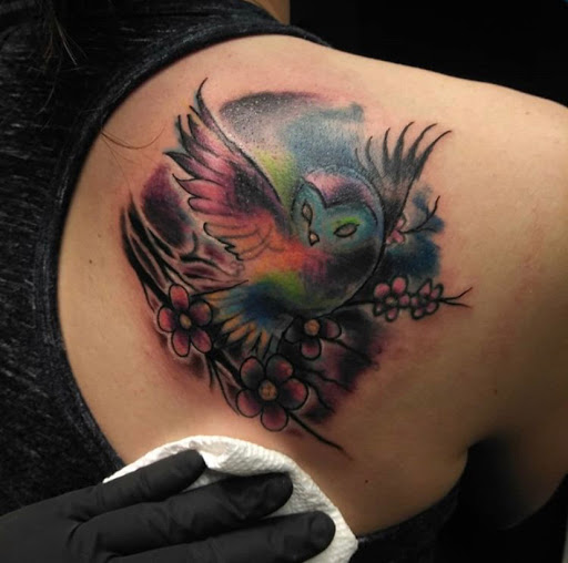 Explore skull hand tattoo ideas, creative tattoo ideas in Cordova, available at The Rook x Raven Tattoo Creative