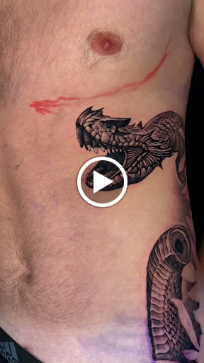 Explore christian tattoo ideas for guys, creative tattoo ideas in West Palm Beach, available at Wooden Heart Tattoos and Piercings