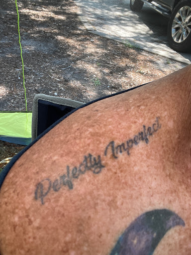 Explore reading tattoo ideas, creative tattoo ideas in Broxton, available at Seratonin Tattoo Parlor