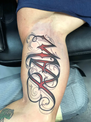 Explore name tattoo ideas for guys, creative tattoo ideas in Saint Petersburg, available at Foolish Pride Tattoo Co.