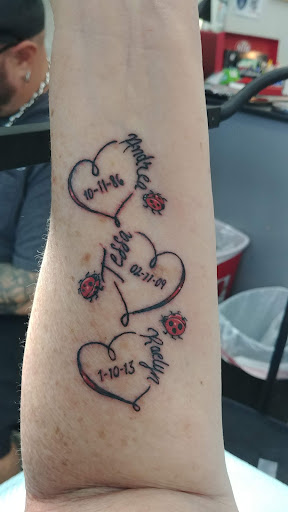 Explore white ink tattoo ideas, creative tattoo ideas in Summerfield, available at Diamond Tattoos & Body Piercings