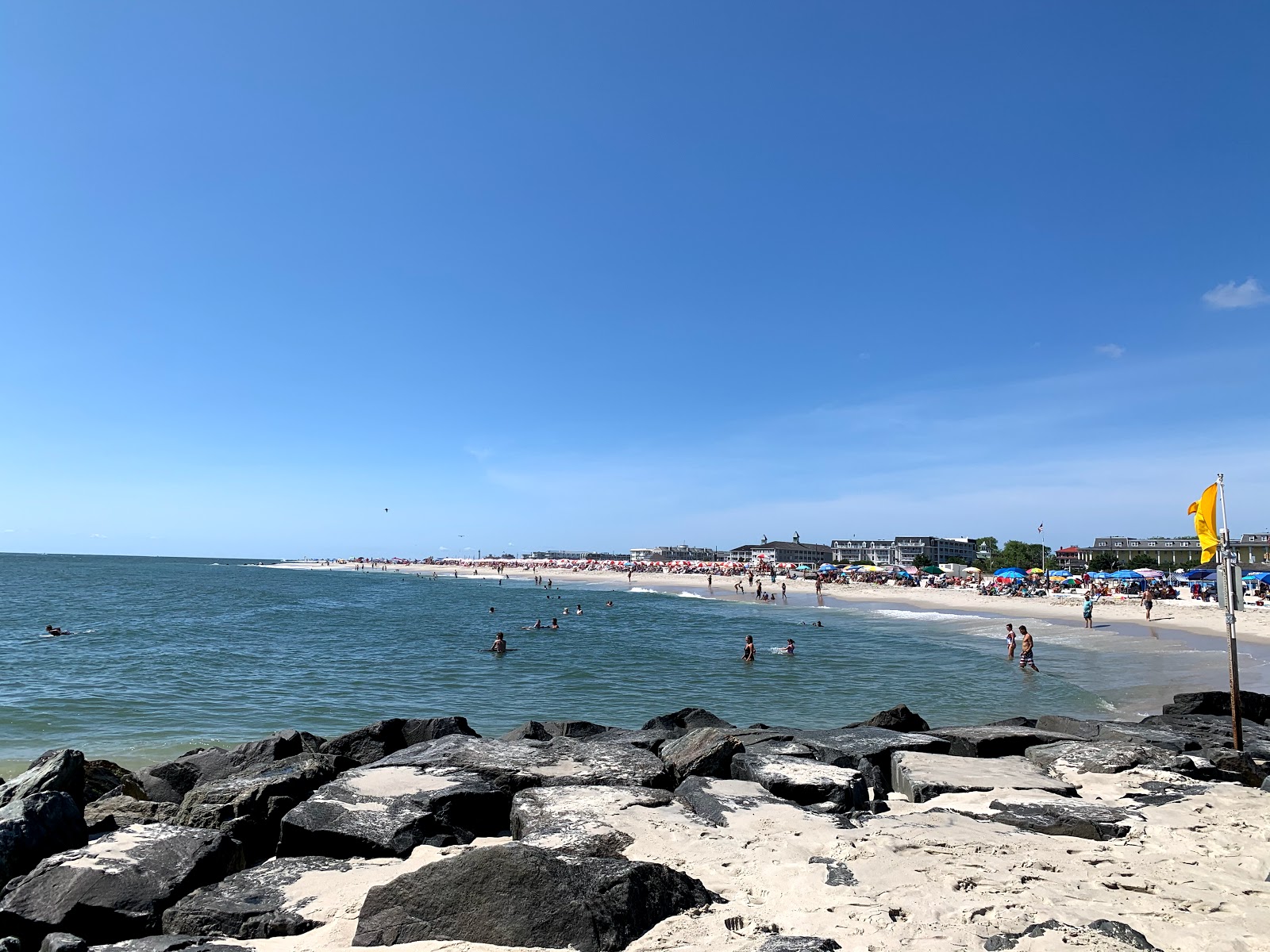 Foto van Cape May Beach NJ met turquoise puur water oppervlakte