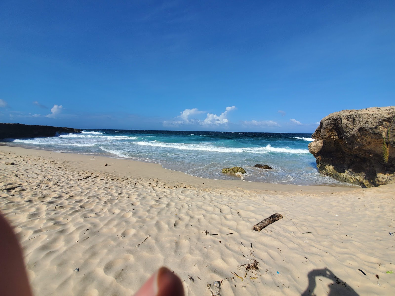 Foto di Wariruri beach con baia piccola