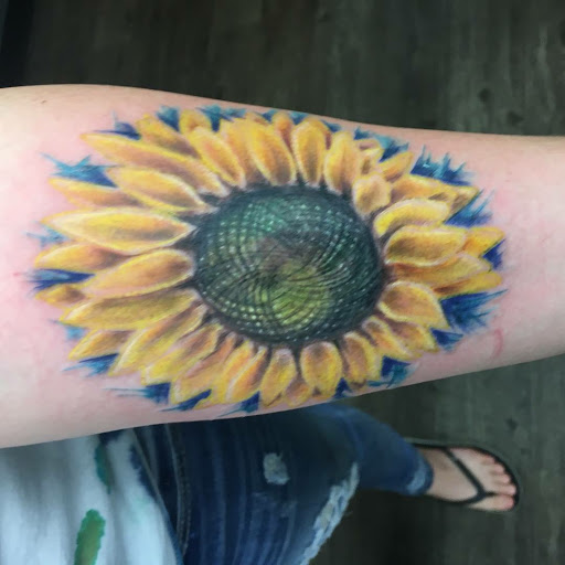 Explore tattoo ideas medium, creative tattoo ideas in Greenfield, available at Tattoos In Time Studio