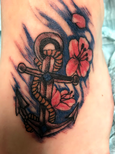 Explore mens script tattoo ideas, creative tattoo ideas in Seymour, available at American Gypsy Tattoo Corp.