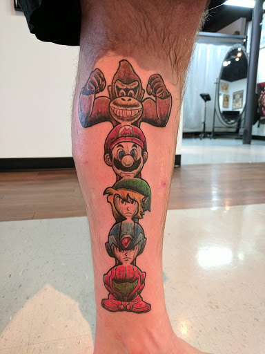 Explore fishing tattoo ideas for guys, creative tattoo ideas in West Fargo, available at Addictions Collective Studios