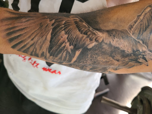 Explore rose hand tattoo ideas, creative tattoo ideas in Montclair, available at Painted Soul Arts