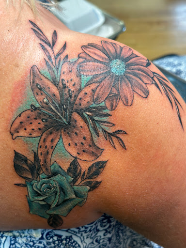 Explore girl thigh tattoo ideas, creative tattoo ideas in Hayward, available at Three Tentacles Tattoo Studio