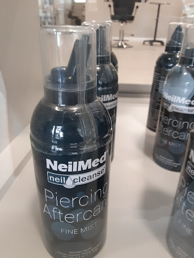 Explore tattoo ideas for the back of the neck, creative tattoo ideas in Oak Park, available at Mainstreet Piercings Tattoos Brows