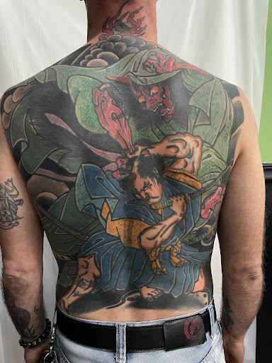 Explore mens western tattoo ideas, creative tattoo ideas in Ormond Beach, available at Shamrock Tattoo