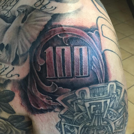 Explore lion tattoo ideas for guys, creative tattoo ideas in Stockton, available at Stockton Tattoo & Piercing