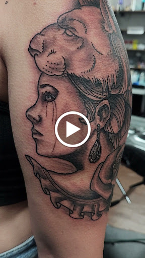 Find tattoo ideas of trees for your next unique tattoo in Rogers at Saved by Grace Tattoo Studio