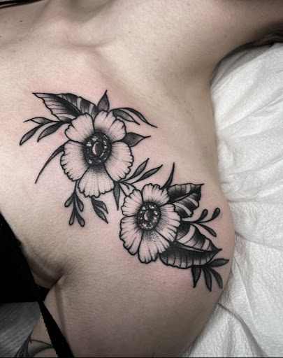 Explore stitch and angel tattoo ideas, creative tattoo ideas in Johnson City, available at Gold Cross Tattoo Co.