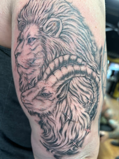 Explore brother tattoo ideas for guys, creative tattoo ideas in Covington, available at Cupid Slave Tattoo Company