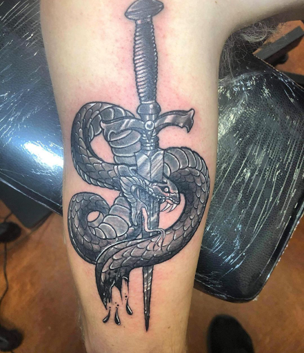 Explore behind neck tattoo ideas, creative tattoo ideas in Aledo, available at Elevated Tattoo & Piercing