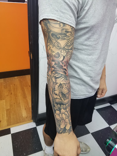 Find tattoo ideas for under the breast for your next unique tattoo in Nicholasville at Castle of Color