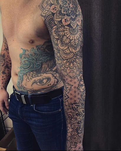 Explore 2002 tattoo ideas, creative tattoo ideas in Salt Lake City, available at EmberSteel Tattoo Studio