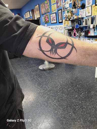 Explore boyfriend name tattoo ideas on chest, creative tattoo ideas in Englewood, available at The Original Big Daddy Tattoo & Body Piercing est.1997 est.1997