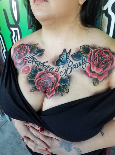 Explore purple flower tattoo ideas, creative tattoo ideas in Lodi, available at Emerald Tattoo & Piercing - Lodi