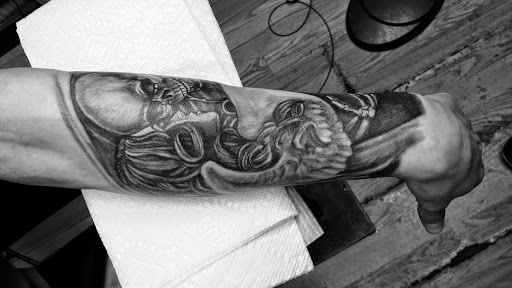 Explore japanese snake tattoo ideas, creative tattoo ideas in Indianapolis, available at Inkfam Tattoo Gallery