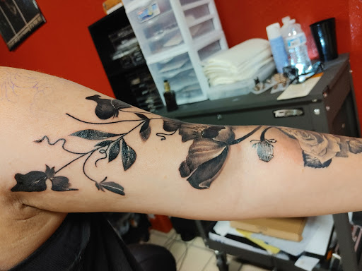 Explore grave tattoo ideas, creative tattoo ideas in Hereford, available at Slow Pain Tattoo Body Art Studio