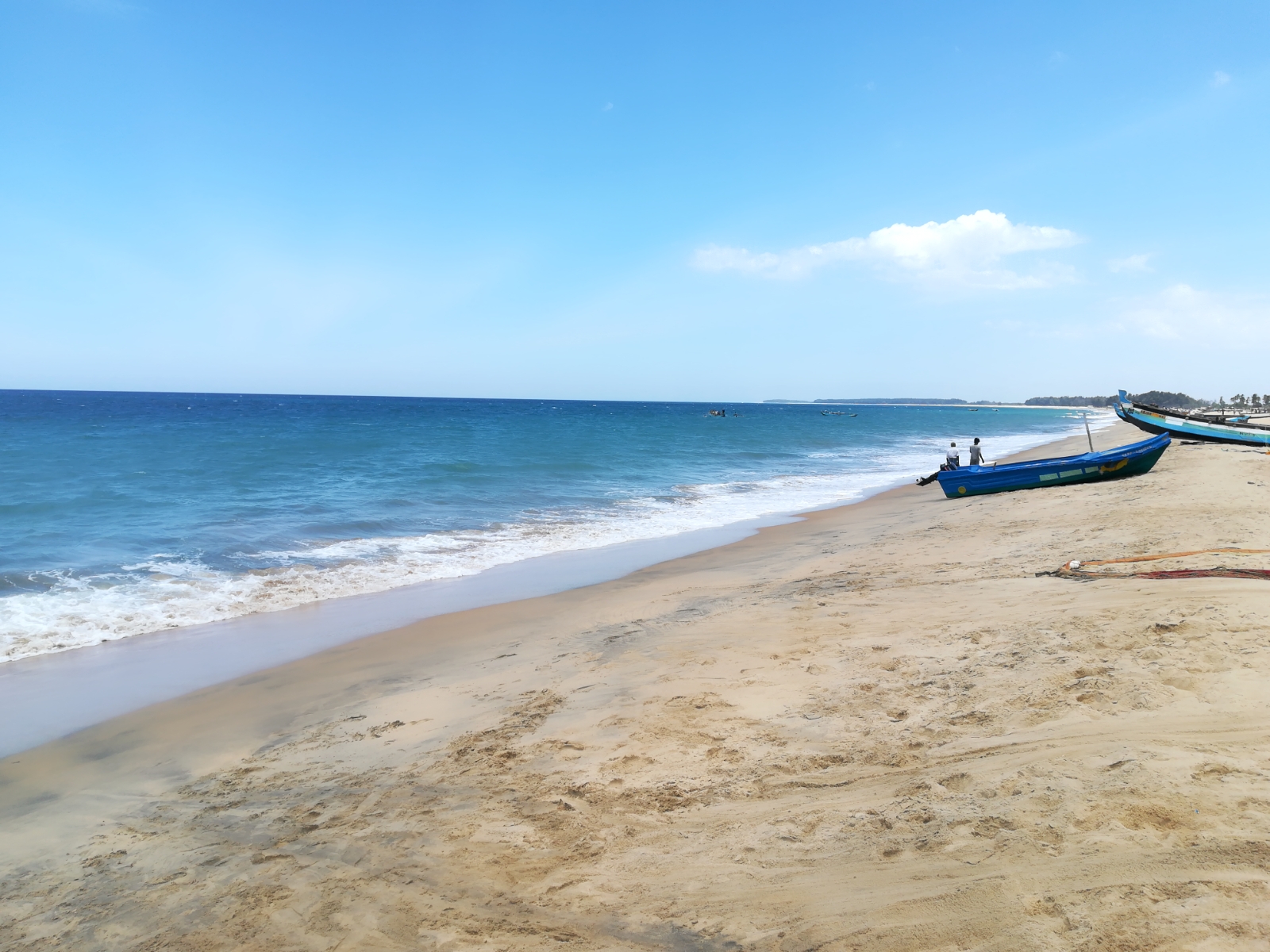 Savukkadi Beach的照片 带有碧绿色纯水表面