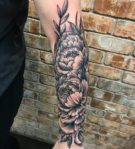 Explore angel tattoo ideas, creative tattoo ideas in Spokane, available at Anchored Art Tattoo