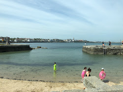 Foto di Sandycove beach e l'insediamento