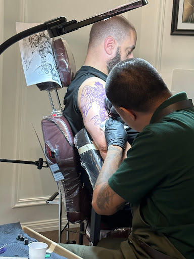 Explore alpha tattoo ideas, creative tattoo ideas in Cromwell, available at Warpath Studio