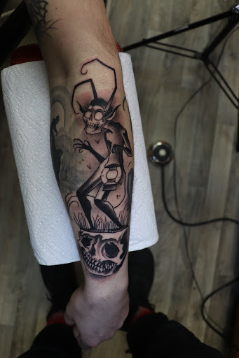 Explore diving tattoo ideas, creative tattoo ideas in Little Falls, available at Elliotts Tattoo