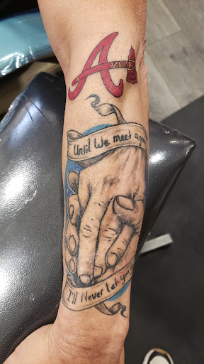 Explore latin tattoo ideas, creative tattoo ideas in Bessemer, available at Gervs Underground Ink
