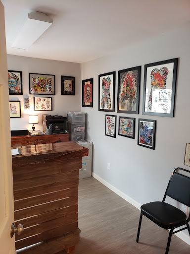 Explore frog tattoo ideas, creative tattoo ideas in Wilton, available at Where Eagles Dare Custom Tattoo