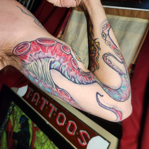 Explore finger hand tattoo ideas, creative tattoo ideas in Augusta, available at Mr. Tattoo