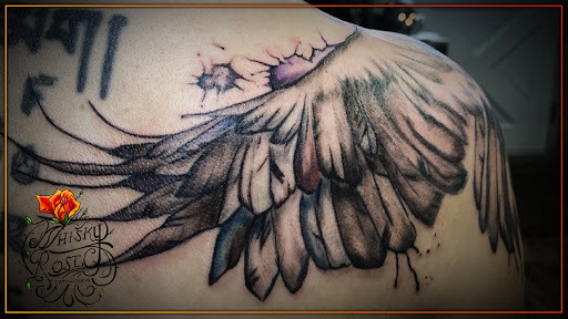 Explore charizard tattoo ideas, creative tattoo ideas in Minocqua, available at Whisky Rose Tattoo Parlor