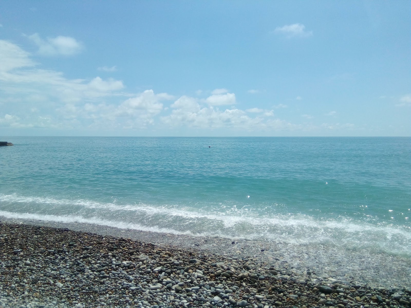 Photo of Smena beach with turquoise pure water surface