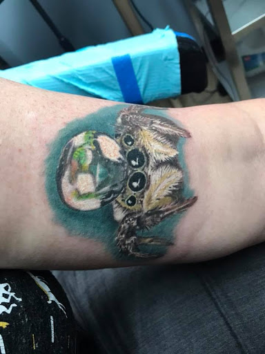 Explore women's lower back tattoo ideas, creative tattoo ideas in Minneapolis, available at The Ink Lab