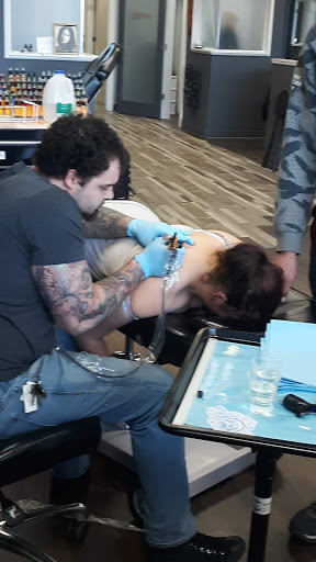 Explore mom son tattoo ideas, creative tattoo ideas in Bradley, available at Oak and Ember Tattoo