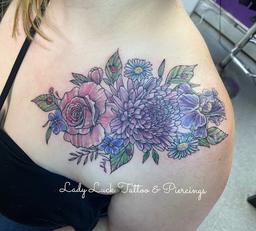 Find sapphic tattoo ideas for your next unique tattoo in Goshen at Lady Luck Studio